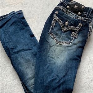 Miss Me buckle jeans with rip at the knee